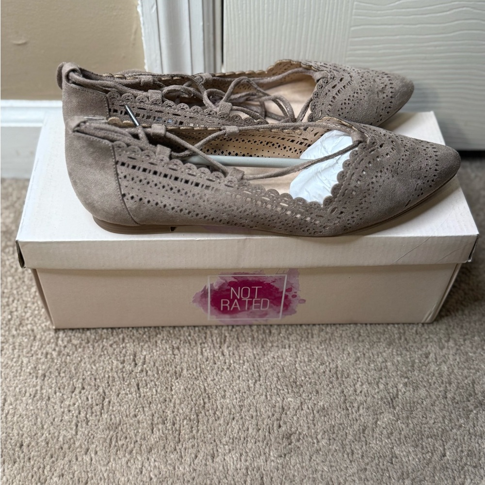 Not Rated Tan Flats with Perforated Design